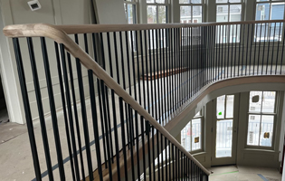Wooden Staircase Iron Rails