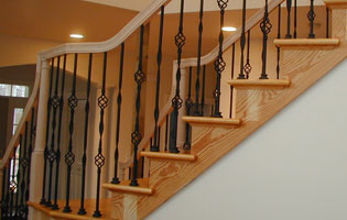 Wooden Staircase Iron Rails