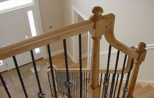 Wooden Staircase Iron Rails