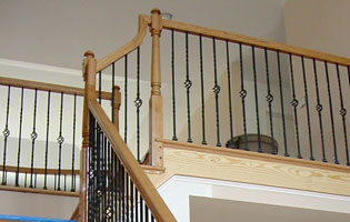 Wooden Staircase Iron Rails